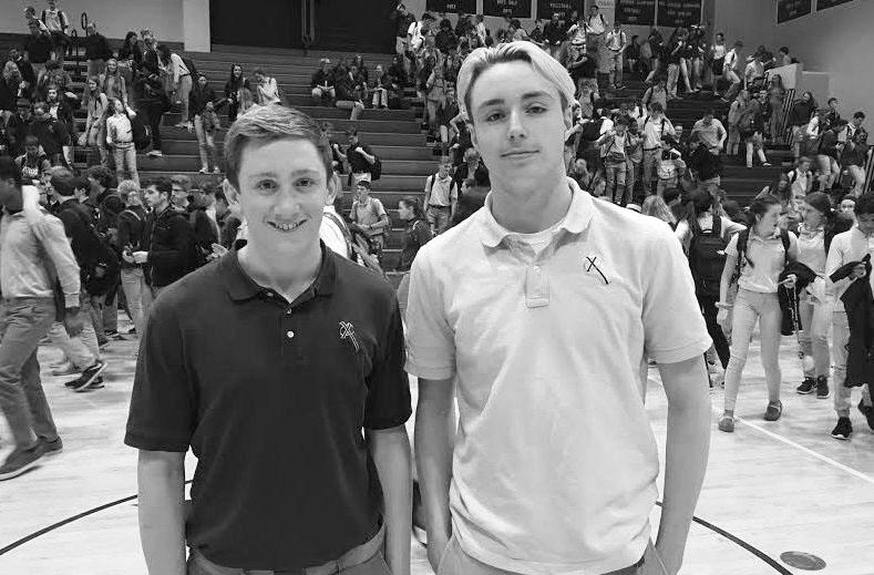 Carter Kramer and George Durin pose for a 
picture after they are 
recognized for qualifiying for state. Nick Ireland Photo.
