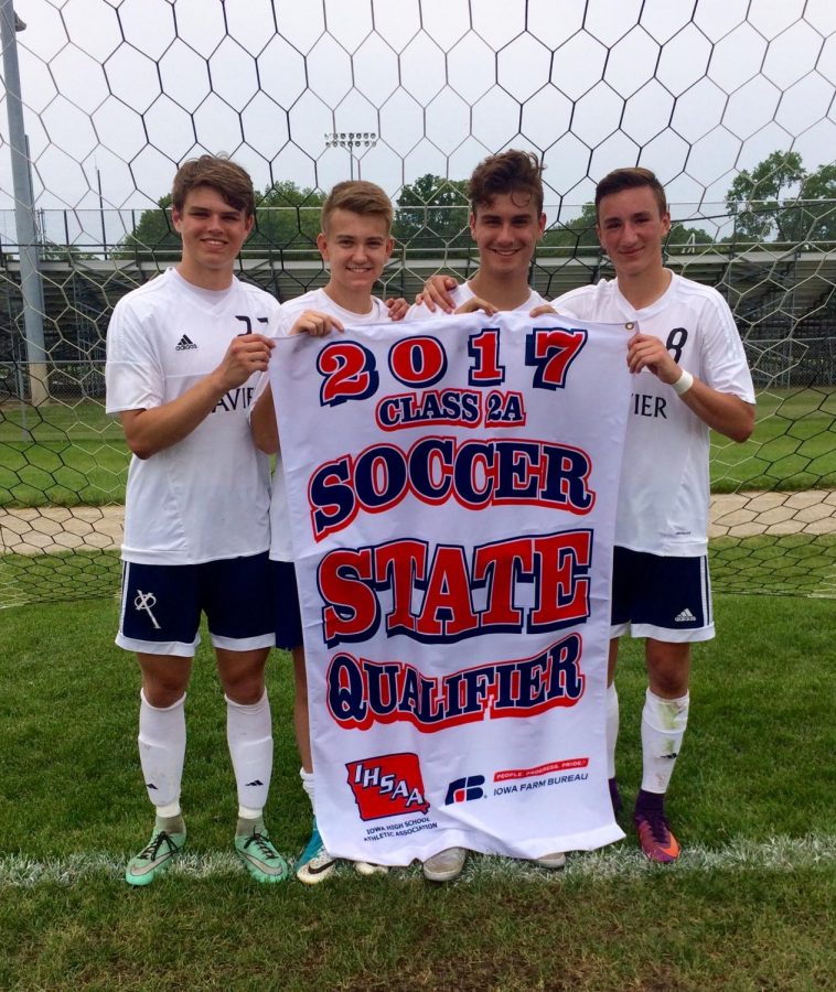 Thomas Bean (far right) and some of his teammates celebrate qualifying for state soccer. Kathleen Bean Photo.